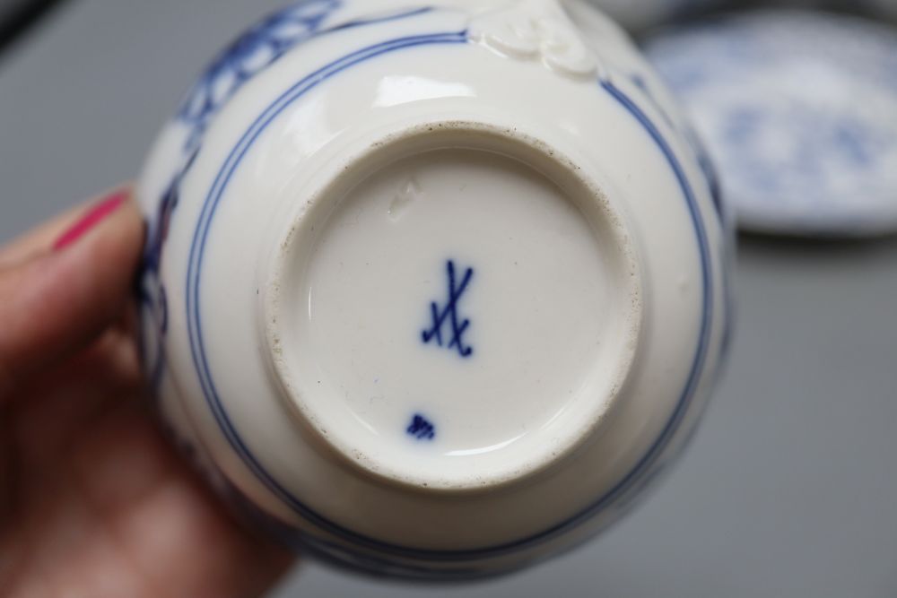 Two Meissen jugs, a cup and saucer and two dishes in blue and white onion pattern, tallest 14cm